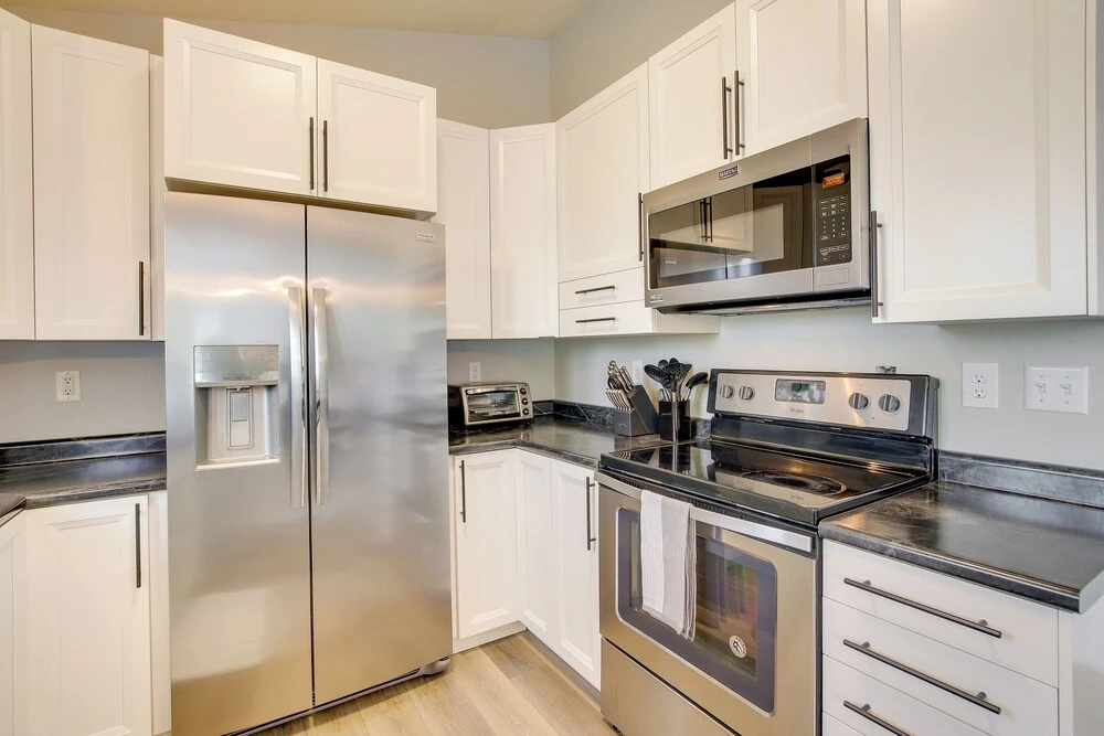 Bright Little Chute Condo w/ Deck & Yard!
