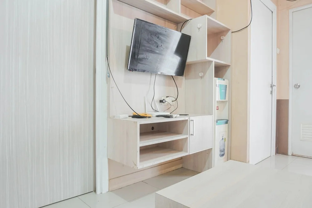 Simple And Cozy Living 2Br At Green Pramuka City Apartment