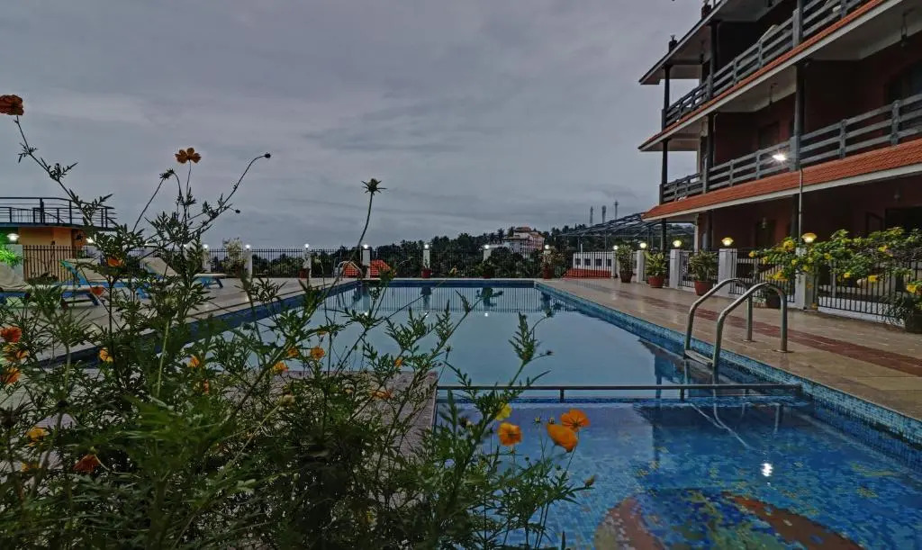 Treebo Trend Green Palm Resorts