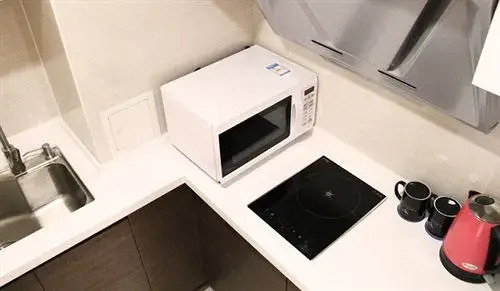 Dalian Sweetome Vacation Rental (Baiyue International)