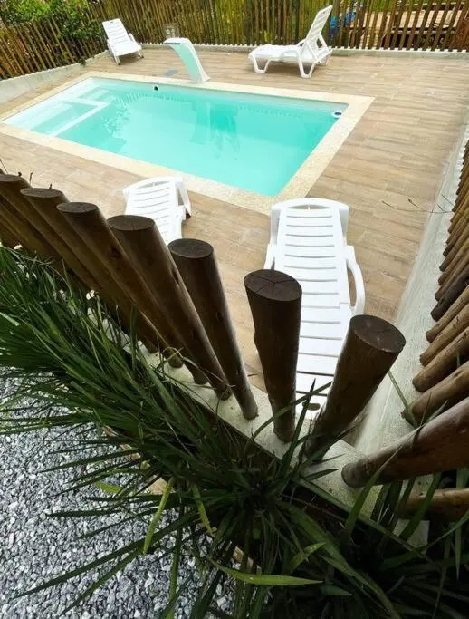 Suíte com cozinha próxima a Trindade Paraty Flats Roots