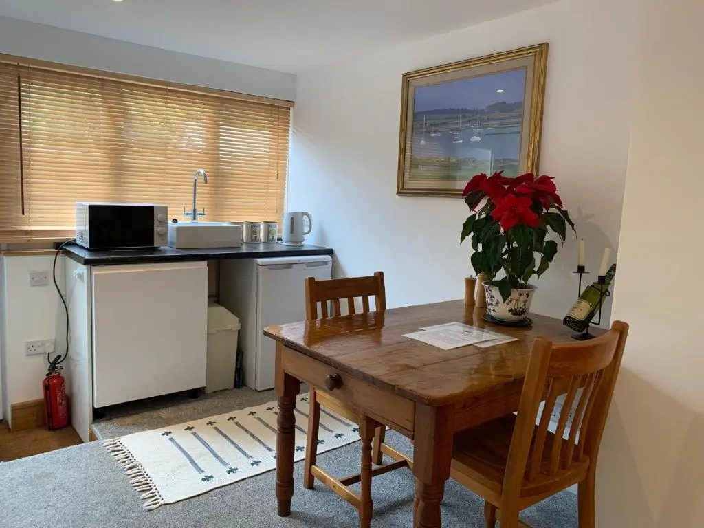 One bedroom self contained annex with own bathroom, sitting room and kitchenette