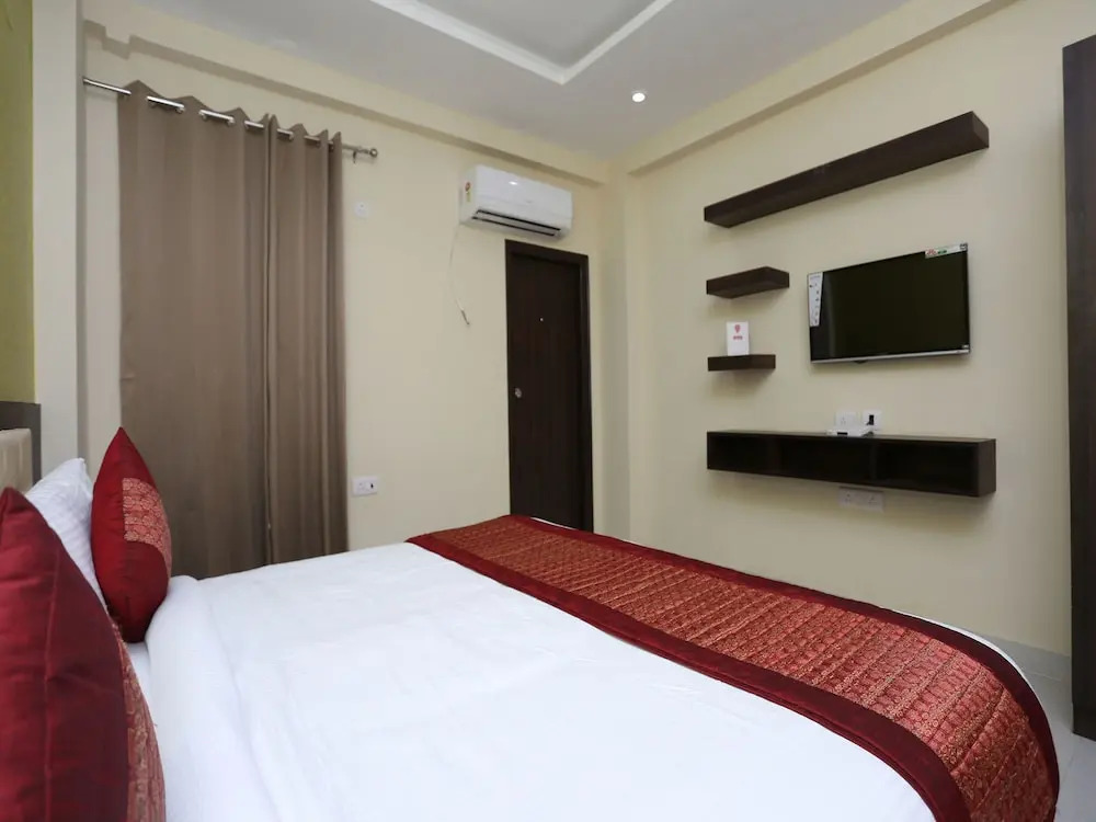 OYO Flagship 12081 Palm Garden Suites