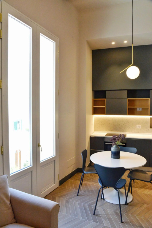 Apartment suitable for families or couples, equipped kitchen and laundry corner, private balcony-Mattia by Dimore Garibaldi