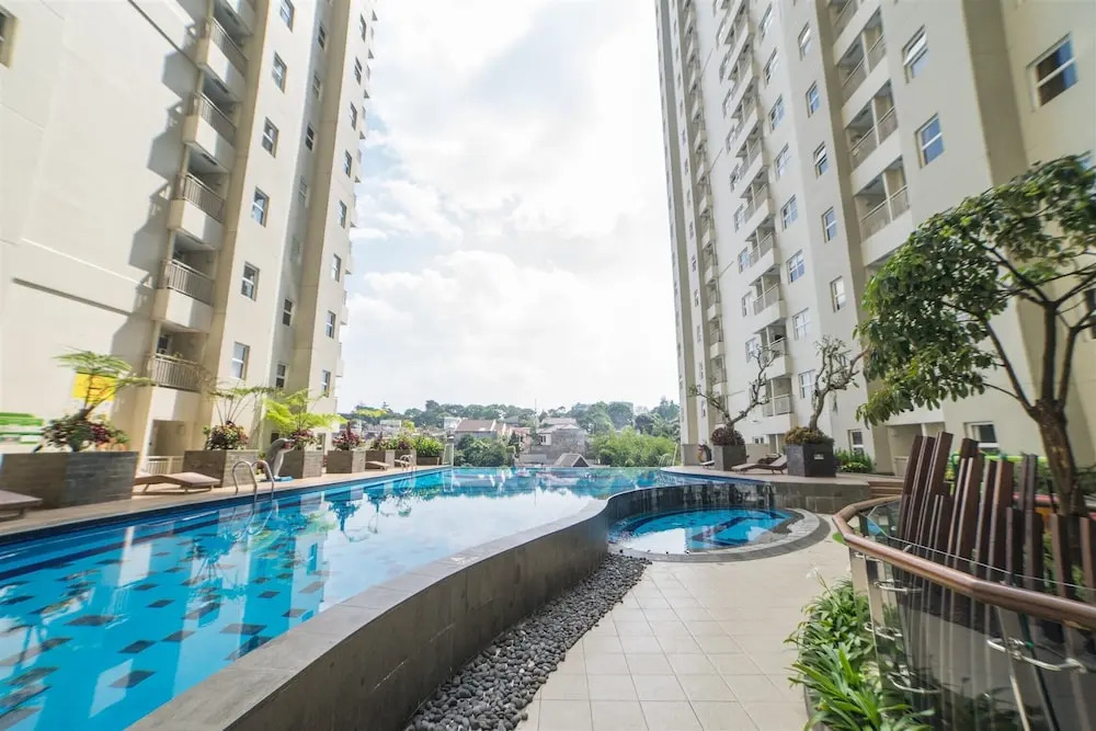 Bright and Private 2BR Apartment at Parahyangan Residence near Nara Park By Travelio