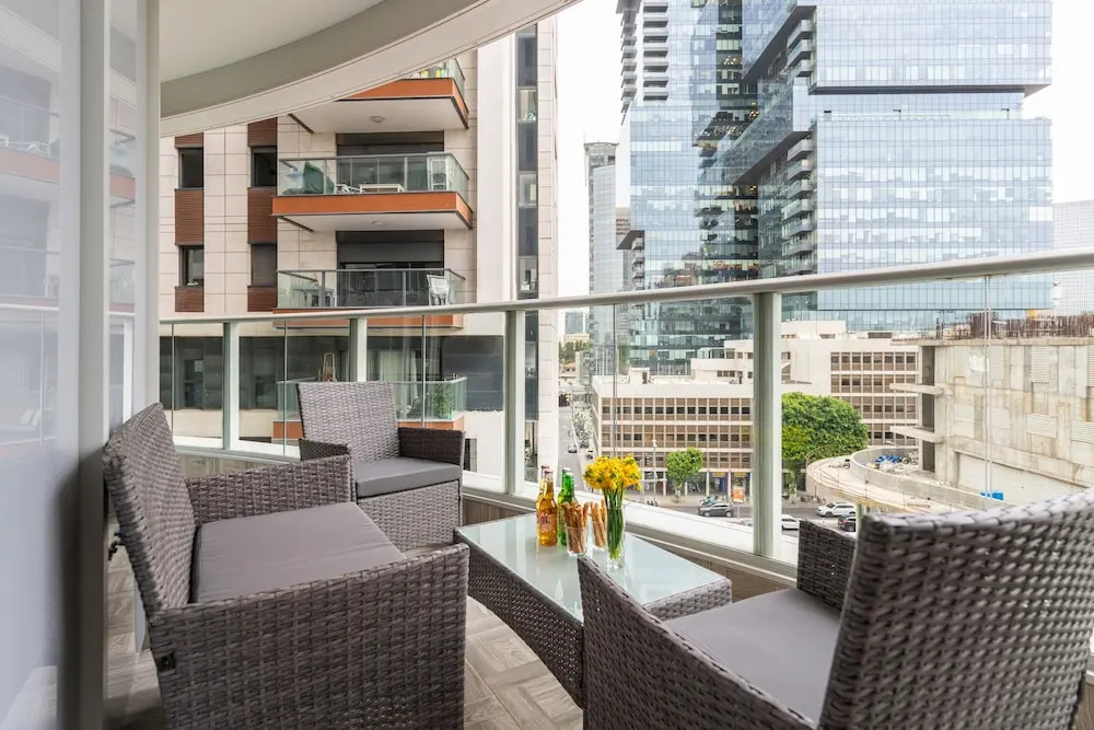 MAMAD - Sunlit Urban Escape with Balcony by Sea N Rent