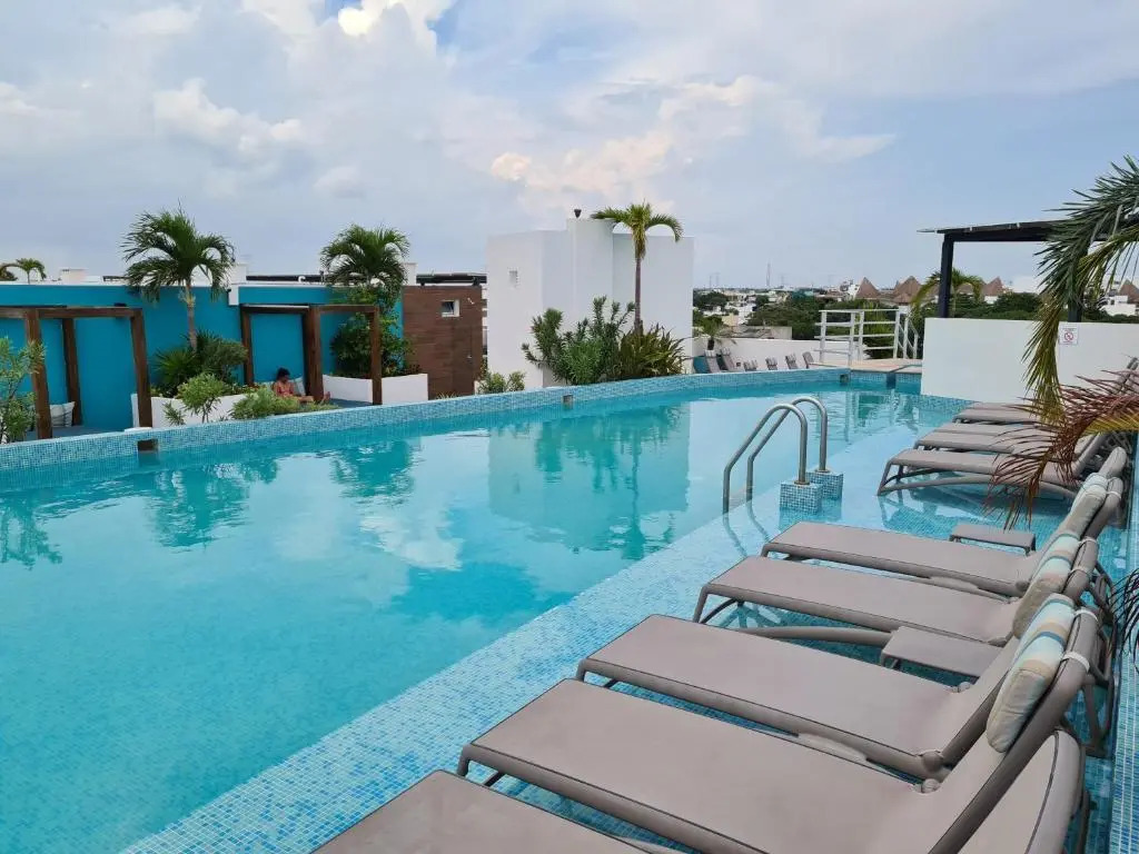 Discover Playa del Carmen from The Gallery Condos steps to the beach