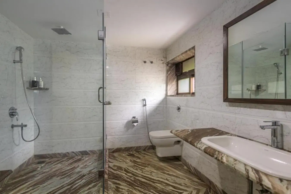 SaffronStays Aura, 4 BR Luxury Pool Villa with Game Room & Lawn