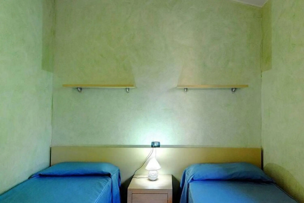 Apartment in Cannegione with communal terrace