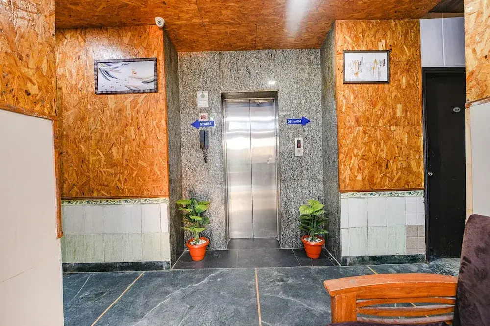 FabHotel The White Orchid - Nr Noida Sector 16 Metro Station Noida