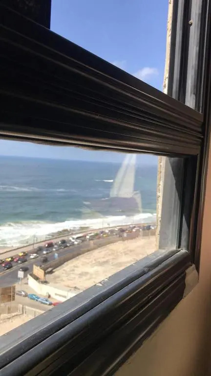 Cozy new 2 BD Amazing beach view Next to Hilton hotel Family only !العائلات فقط