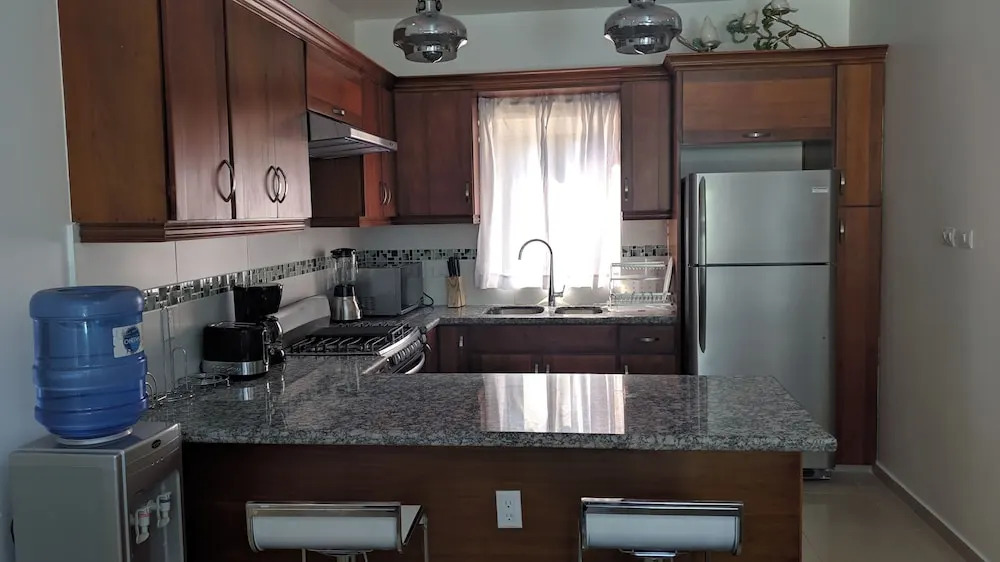 Modern & Private Tropical Villa in Gated Community Minutes From the Beach
