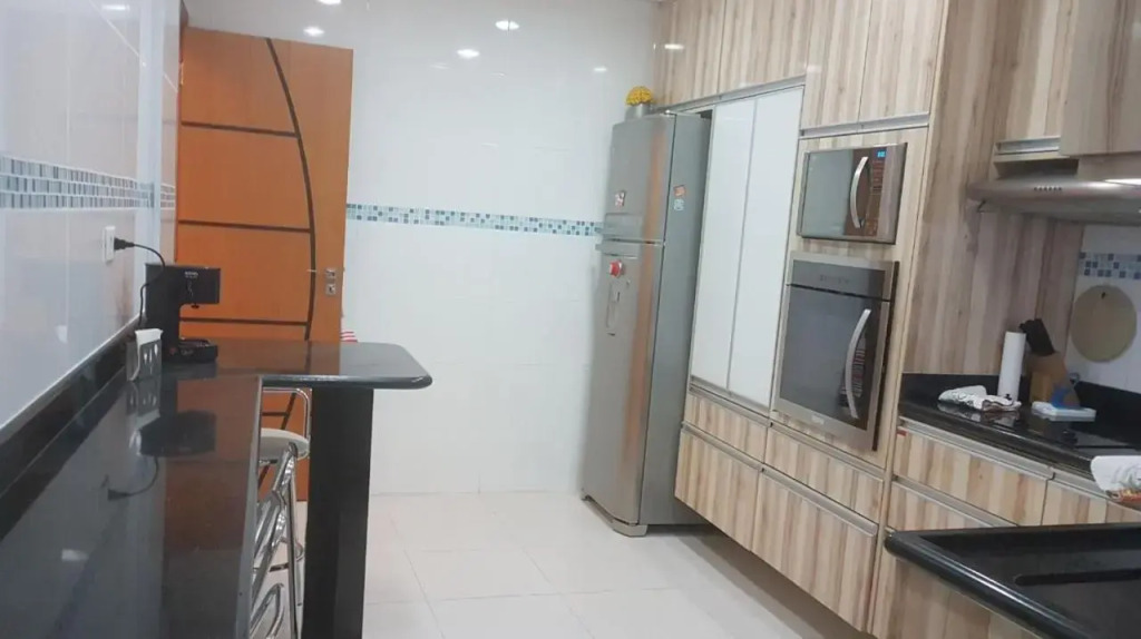 A melhor vista de Santos para 5 pessoas pé na areia