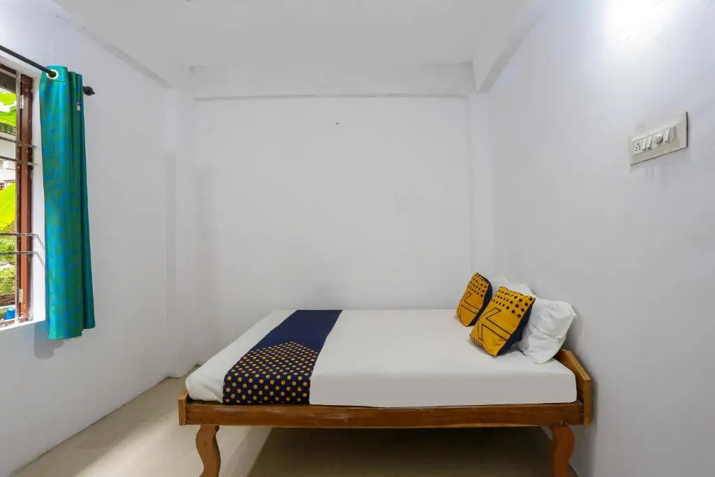 SPOT ON Thozhupaadan Residency
