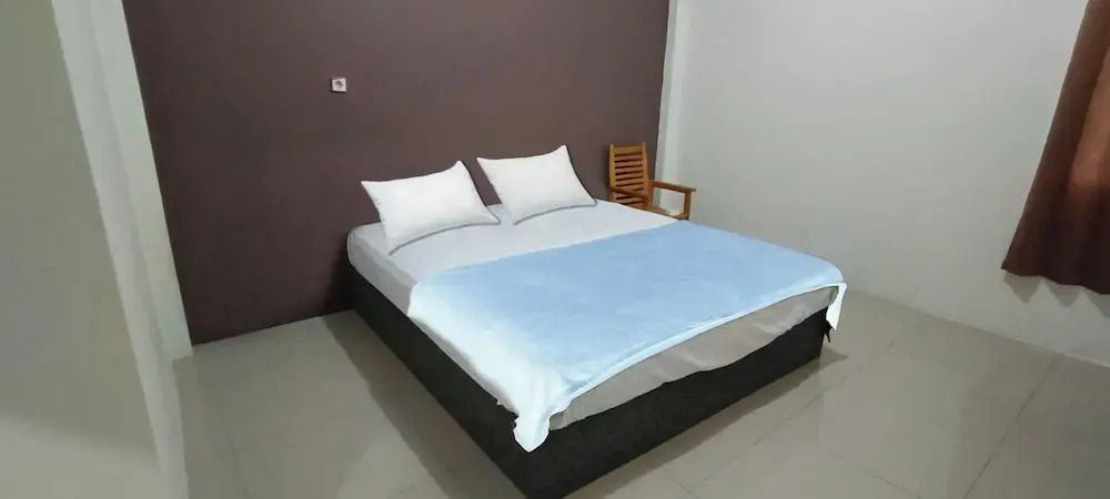 Hotel O Wisma Deli Syariah Near RSUD Nene Mallomo Sidenreng Rappang