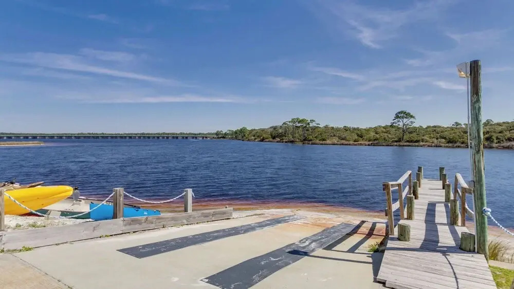 Beachfront Charm Meets Lake Life + Free Tickets: Dolphin Cruise & More!