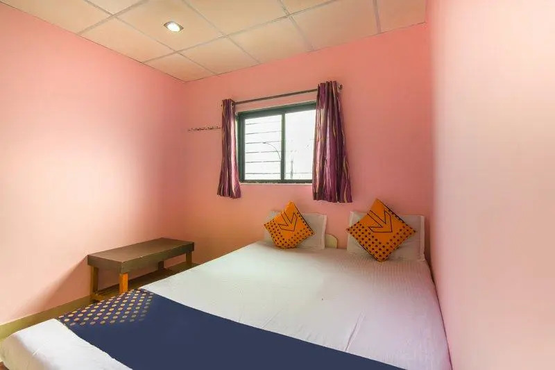 SPOT ON 65135 Hotel Suvarna Samrat Lodge