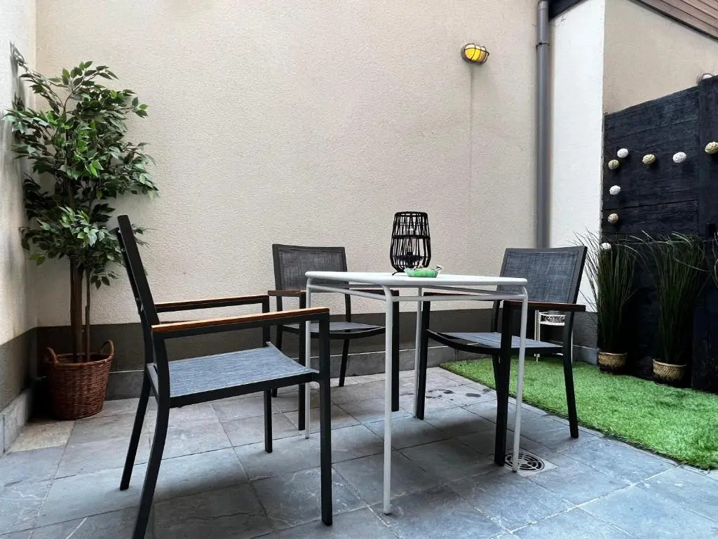 Modern cozy studio with backyard