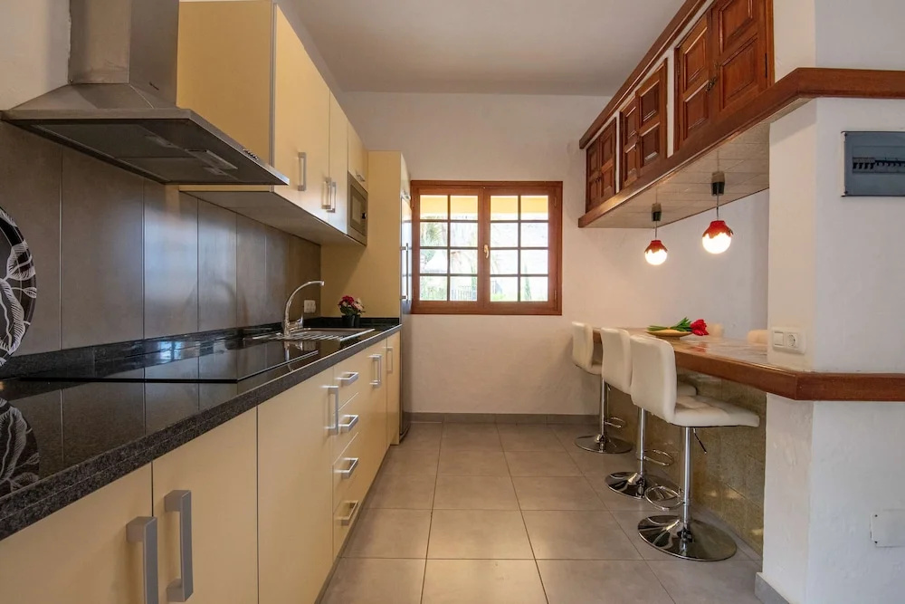 Casa de vacaciones con piscina compartida en Mogán IV