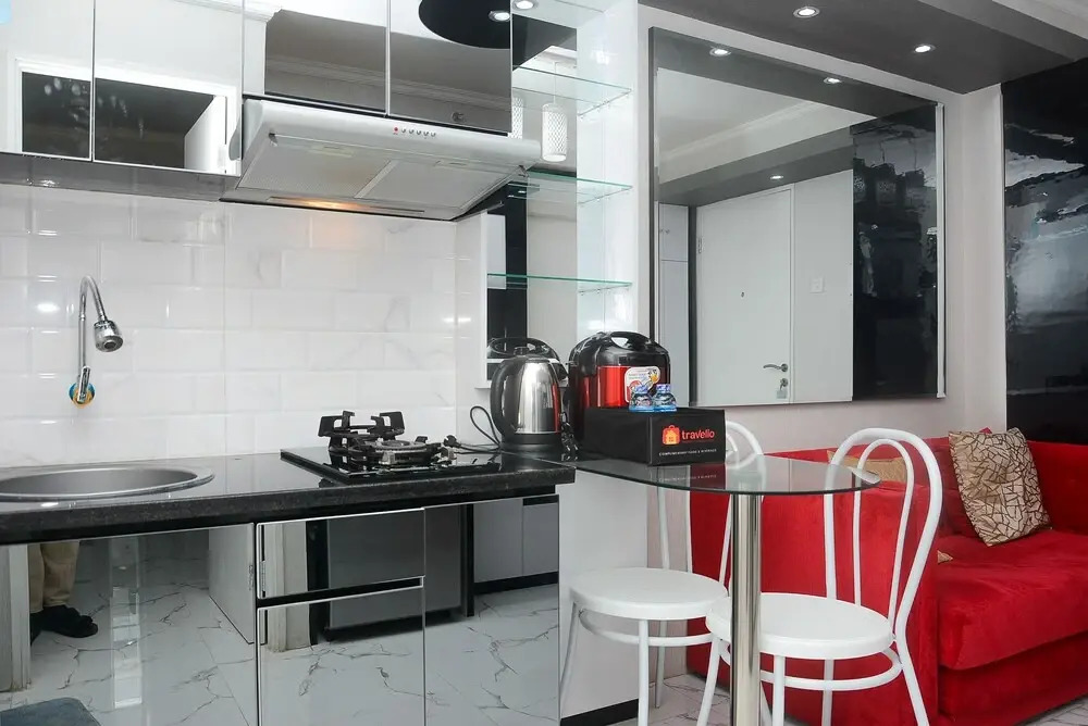 Tranquil and Comfy 2BR Bassura City Apartment near Mall By Travelio