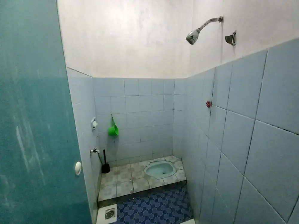 OYO 95096 Dewi Sudirman Guest House
