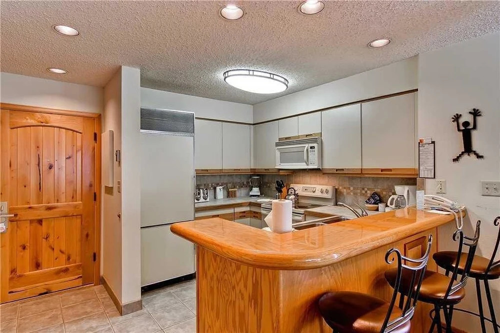 1210 Trappeur's Lodge, Trappeur's Crossing Apartment 1