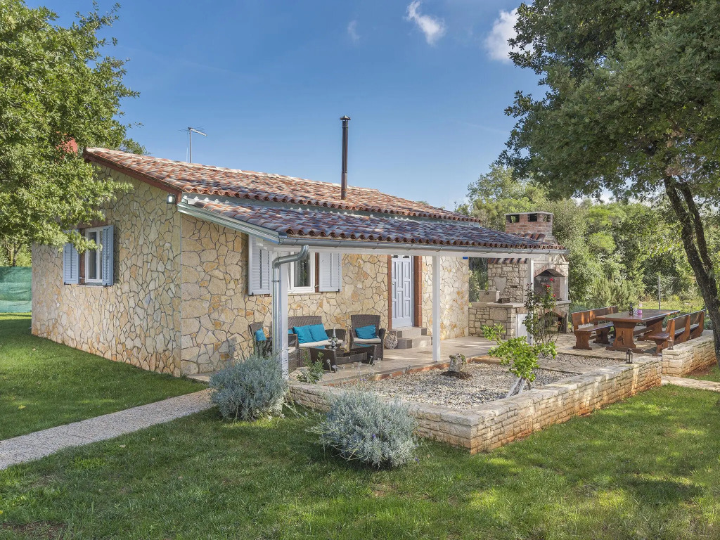 Holiday House with pool, garden, playground and BBQ - surrounded by nature