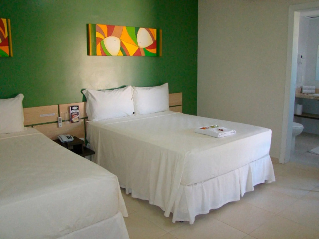Hotel Rosa da Ilha Guaruja - 80m do mar, 02 piscinas, sala de jogos, brinquedão de percurso para crianças