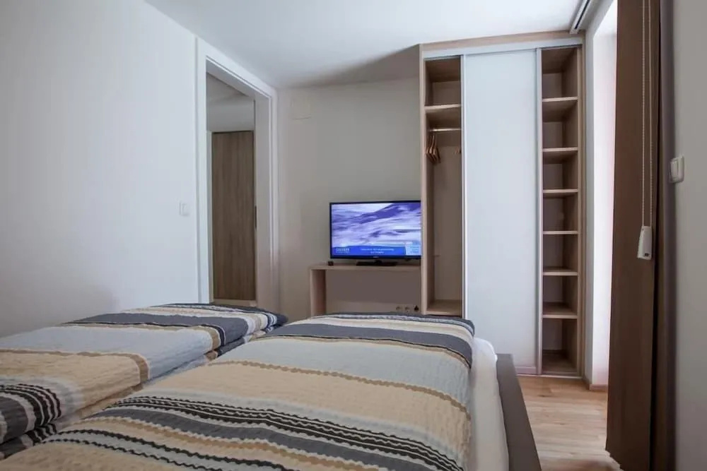 Alpine Appart - Premium Family Apartments and Natural Swimming Pond