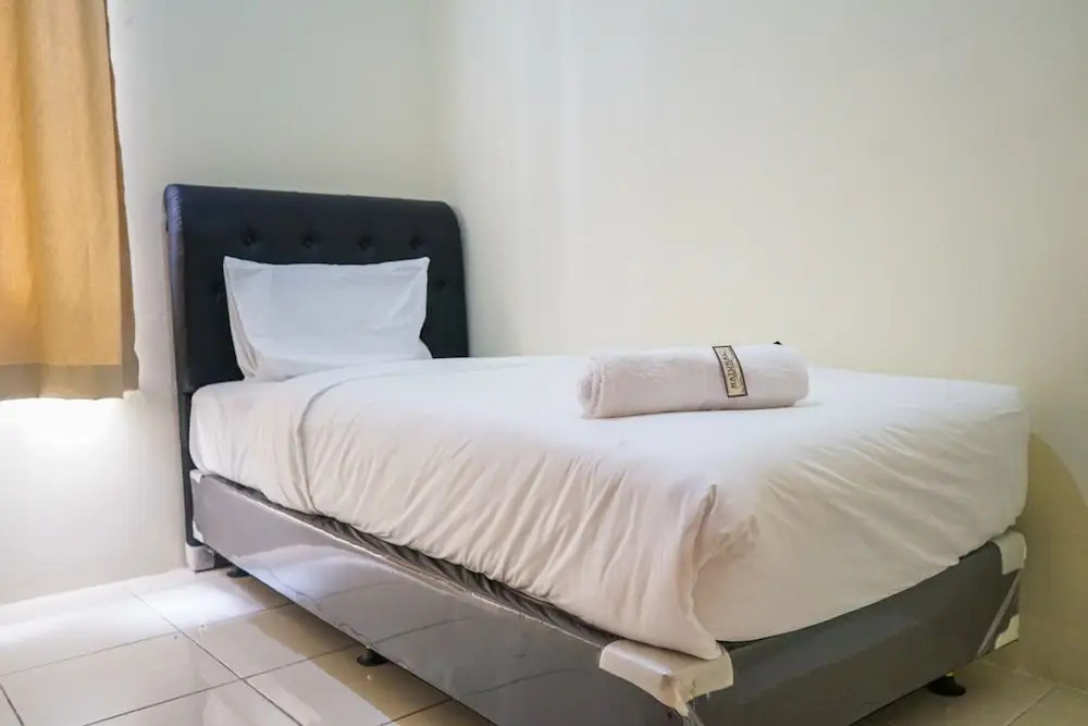 Minimalist 2BR Mediterania Marina Residences By Travelio