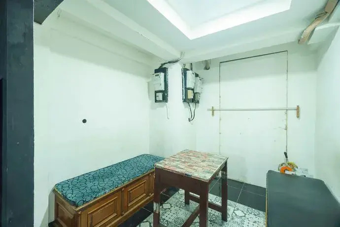OYO 93133 Hotel Moraja Near Stikes Abdi Nusantara