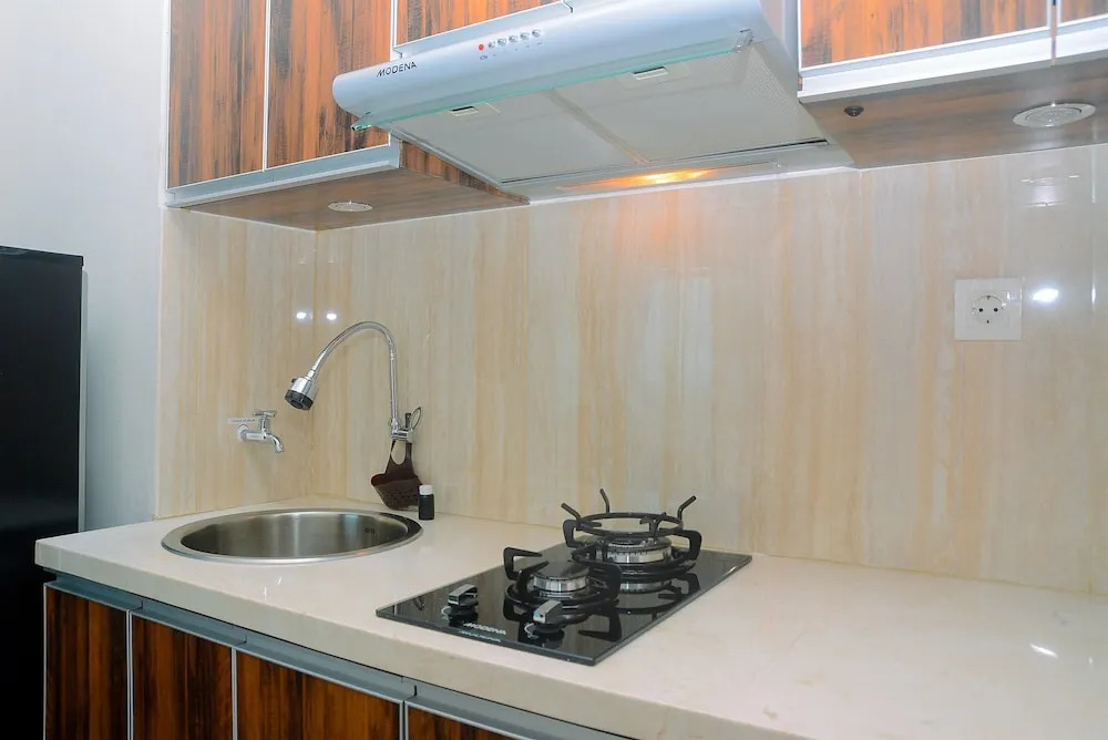 Cozy Living 1BR at Grand Kamala Lagoon Apartment By Travelio
