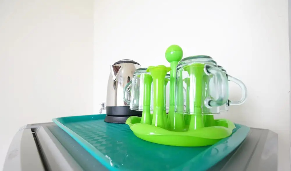 Furnished Studio with Comfortable Design Green Pramuka Apartment