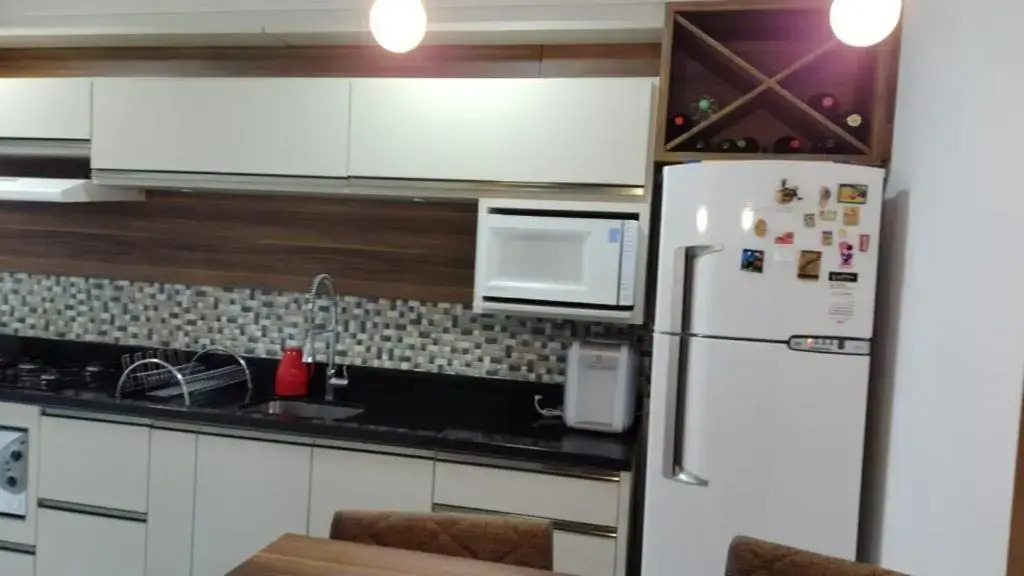 Apto a uma quadra do mar em torres