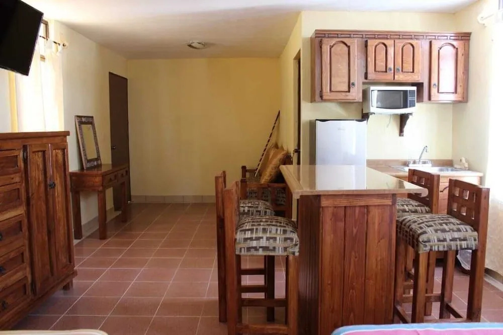 Capital O Las Calzadas Hotel & Suites