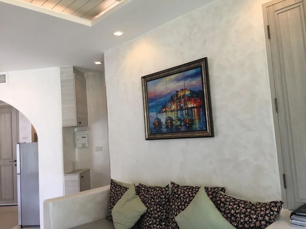 The Che Pool Access Beachfront Condo by Away
