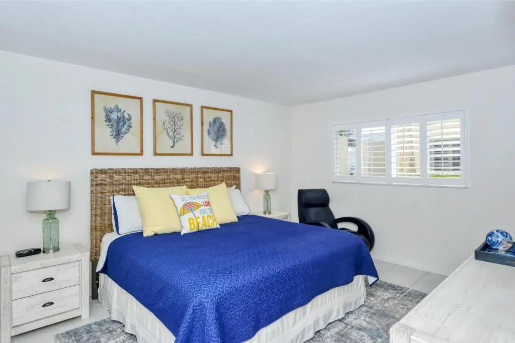 LaPlaya 101A Step out to the beach from your screened lanai Light and bright end unit