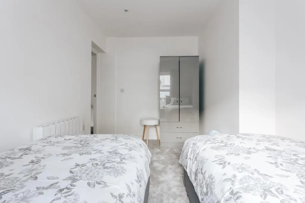 Contemporary Two Bedroom Duplex - Secluded Residence with Parking in a Prime Central Location