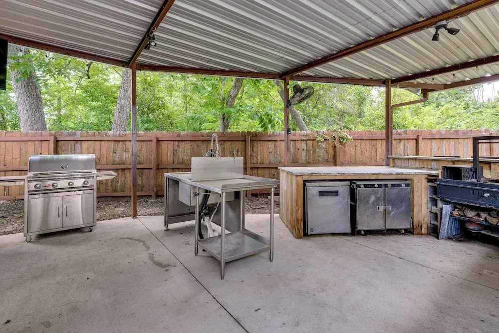 Hot Tub + Outdoor Kitchen: Stylish Home in Bryan