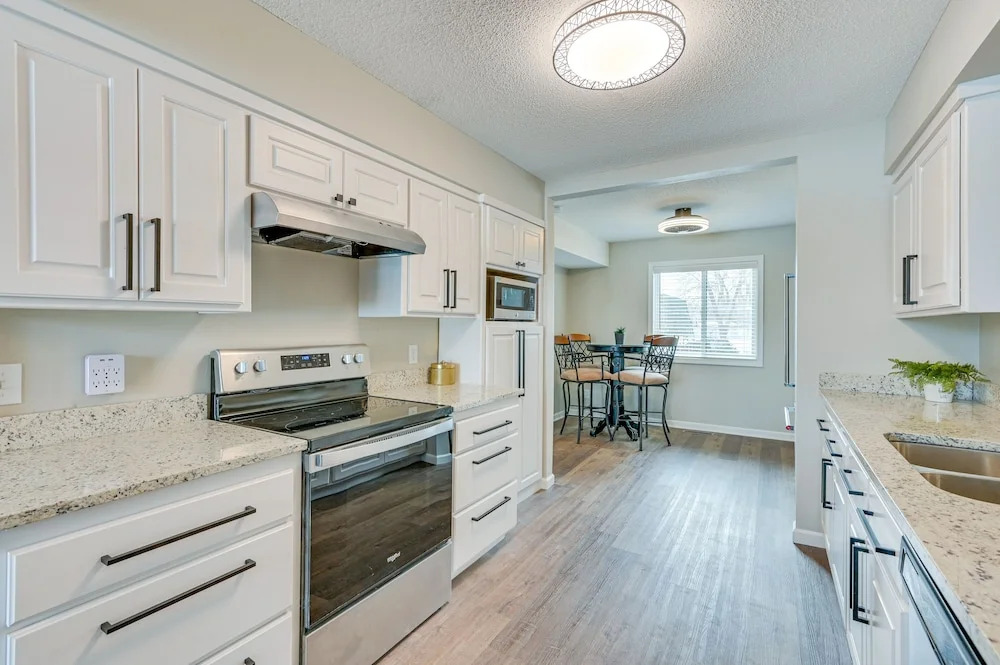 Riverfront Champlin Townhome w/ Deck & Water View!