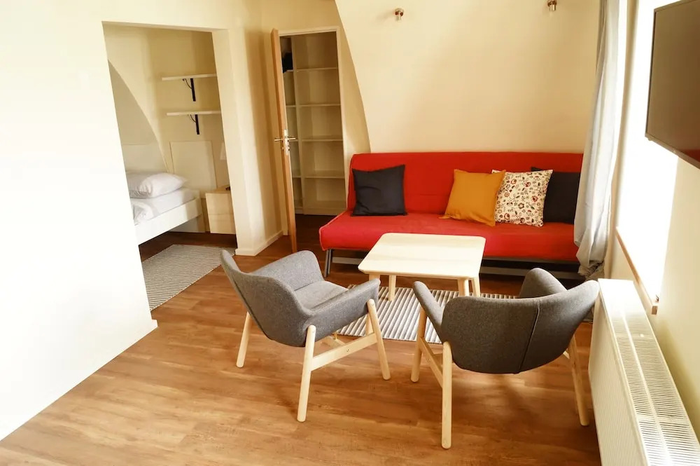 Apartmány u komína