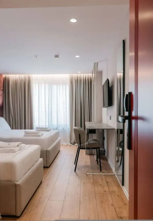 Ermes Deluxe Triple Room