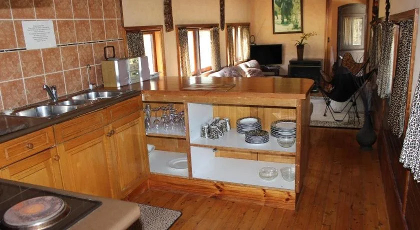 Krinklewood Cottage and Train Carriages