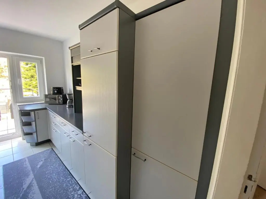 Ferienwohnung mit Balkon und Garten OG