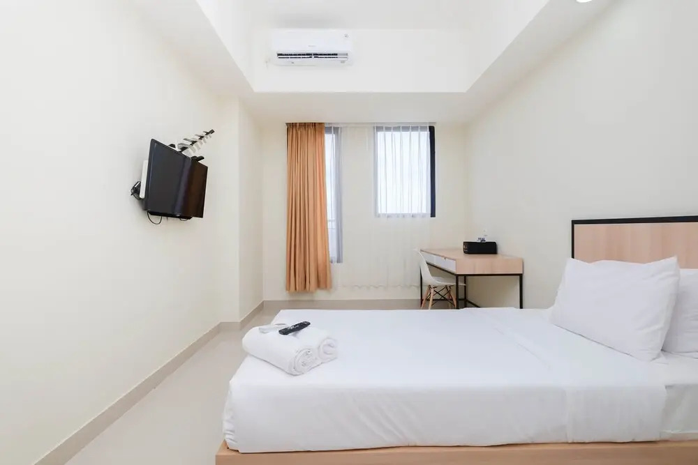 Best Deal and Tidy Studio at Evenciio Margonda Apartment By Travelio
