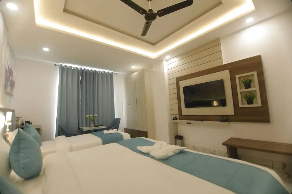 Treebo Premium Paarth Grand with Pure Veg Restaurant