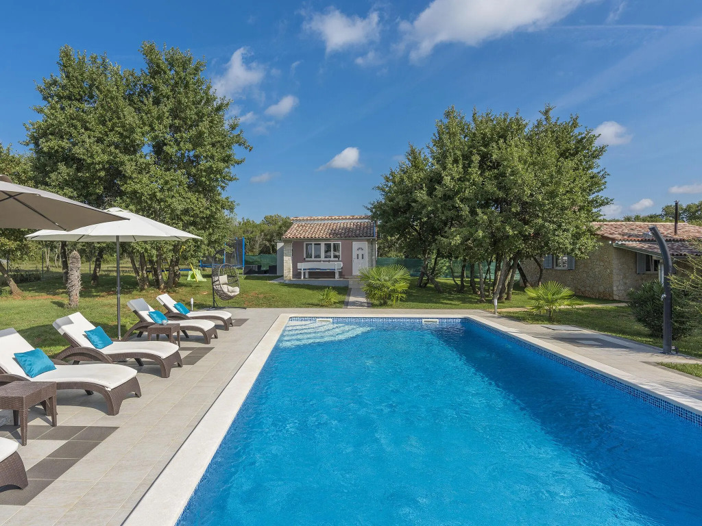 Holiday House with pool, garden, playground and BBQ - surrounded by nature