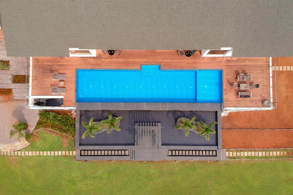 StayVistas Villa 107 at Canary Farms - Pure Veg with Huge Lawn, Pool and Home Theatre