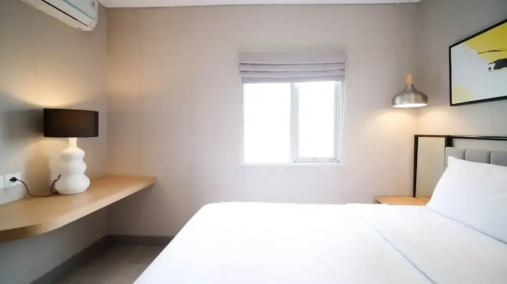 Minimalist and Beautiful 1BR with Extra Room at Pavilion Permata Apartment By Travelio