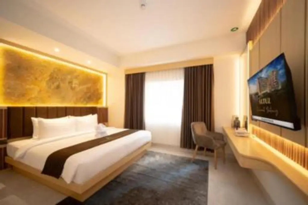 Cozy Stay Studio Room at Altuz Seturan Yogyakarta Apartment By Travelio